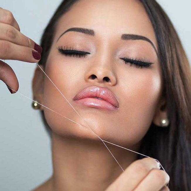 Chin Threading on Woman