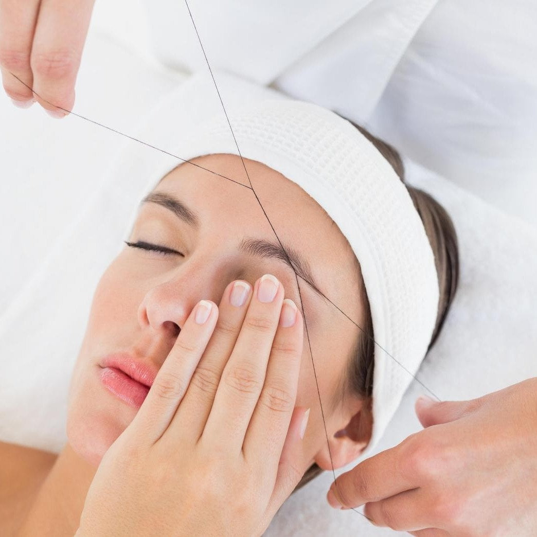 Facial Threading Lying Down