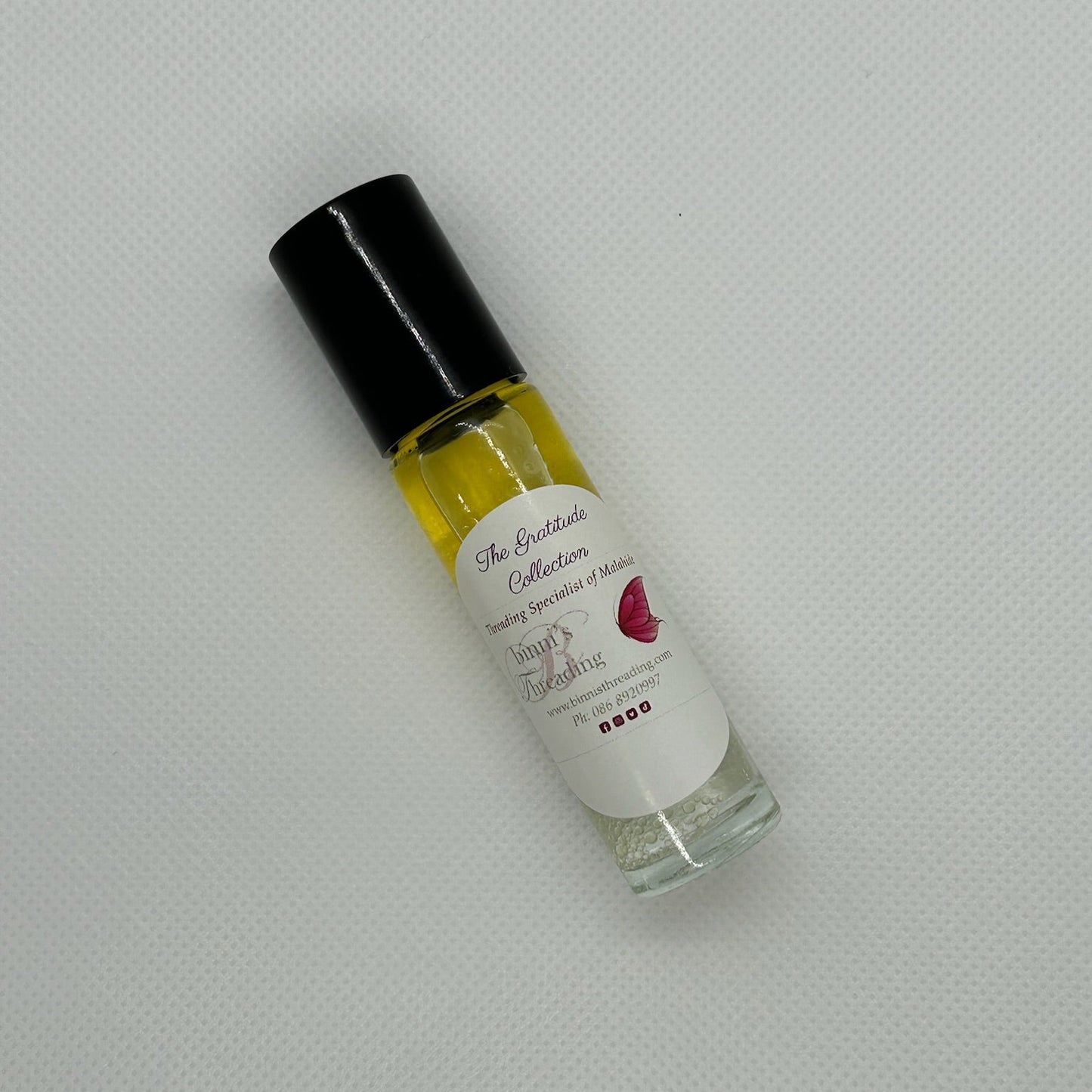 Glow with Gratitude. Skin & Spot Remedy Bottle Lying Down
