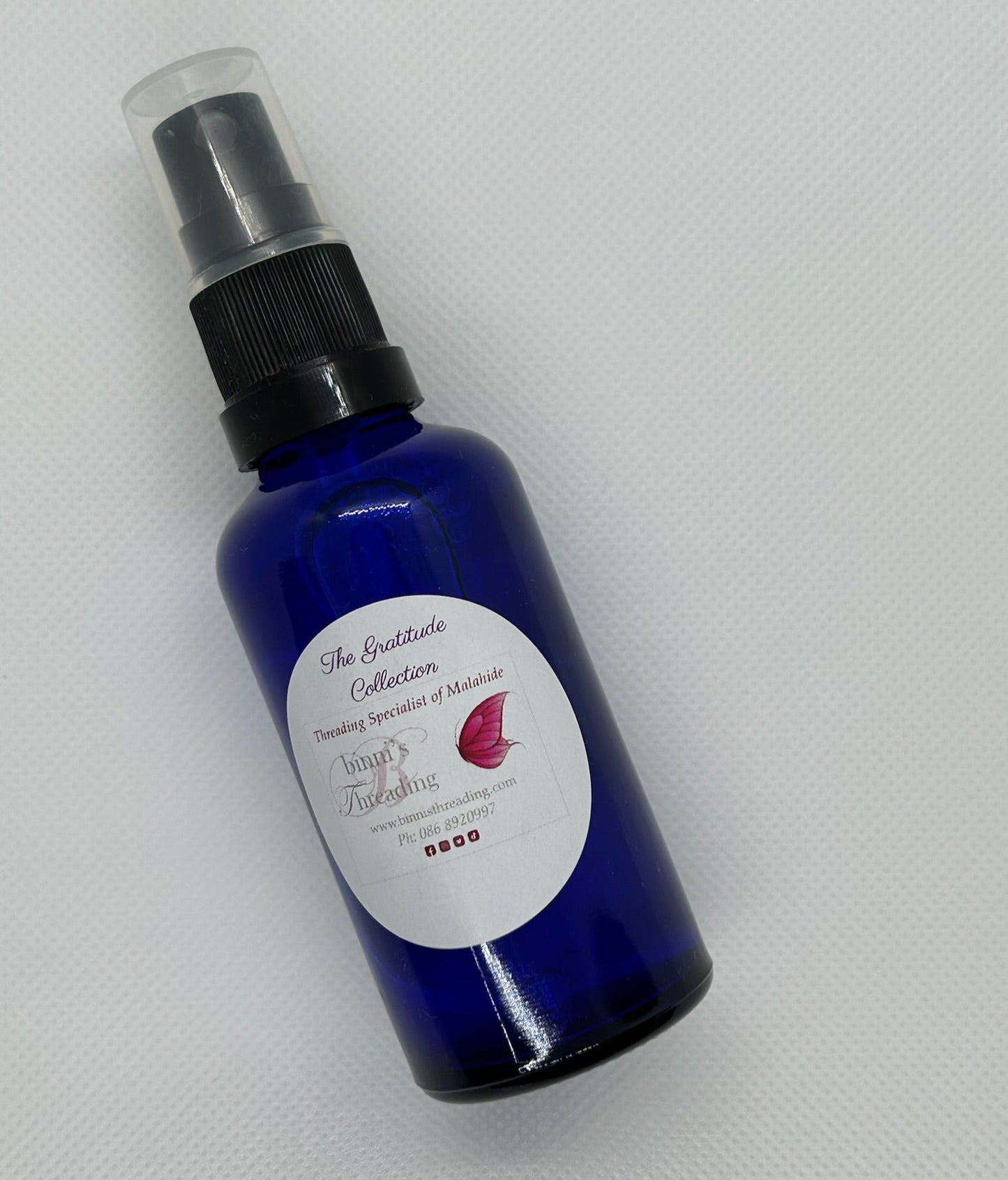 Grateful. Smell the Roses Luxury Face Spray Bottle Lying Down