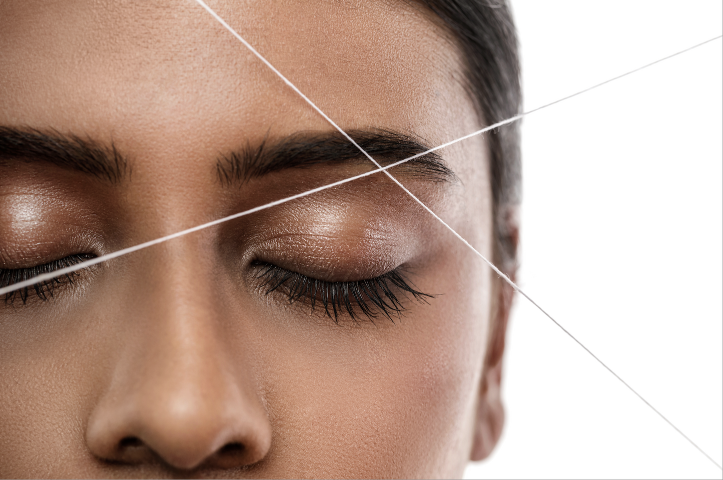 Eyebrow Threading Thread on Face